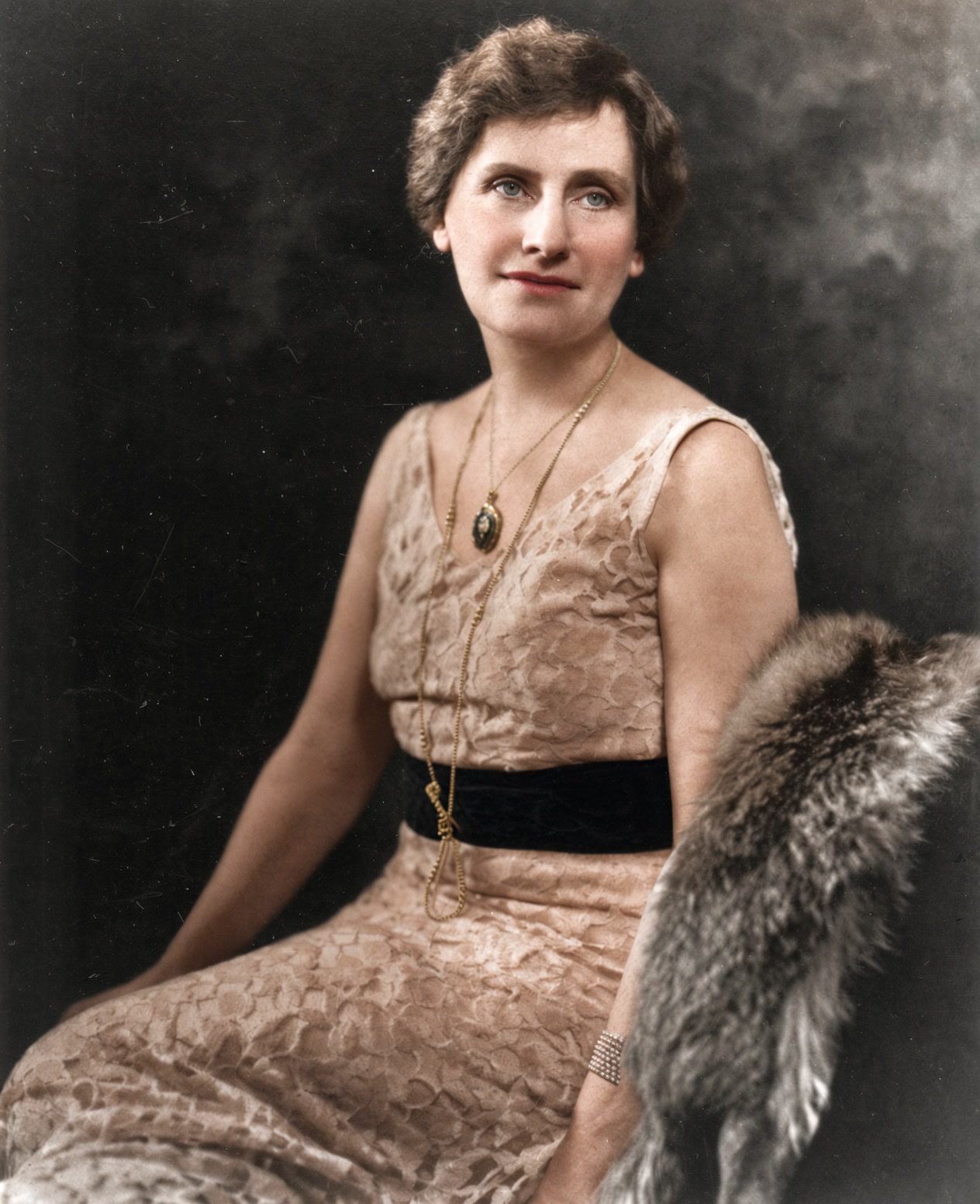 Black-and-white portrait of Nellie Tayloe Ross seated in a dark dress with a light collar.
