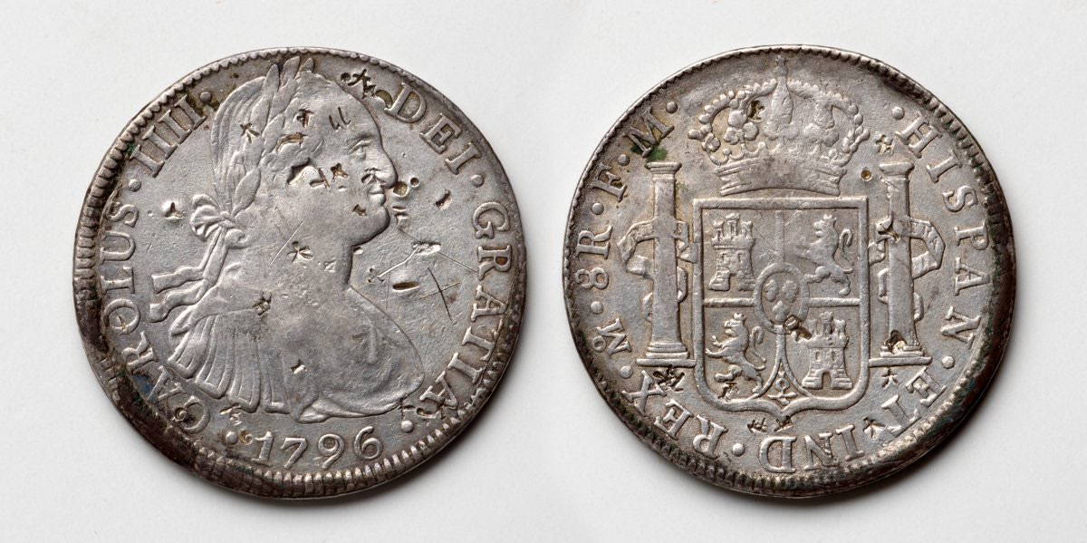 Card stating that Spanish and Mexican silver dollars, pieces of eight, were U.S. legal tender until the Coinage Act of 21 February 1857.