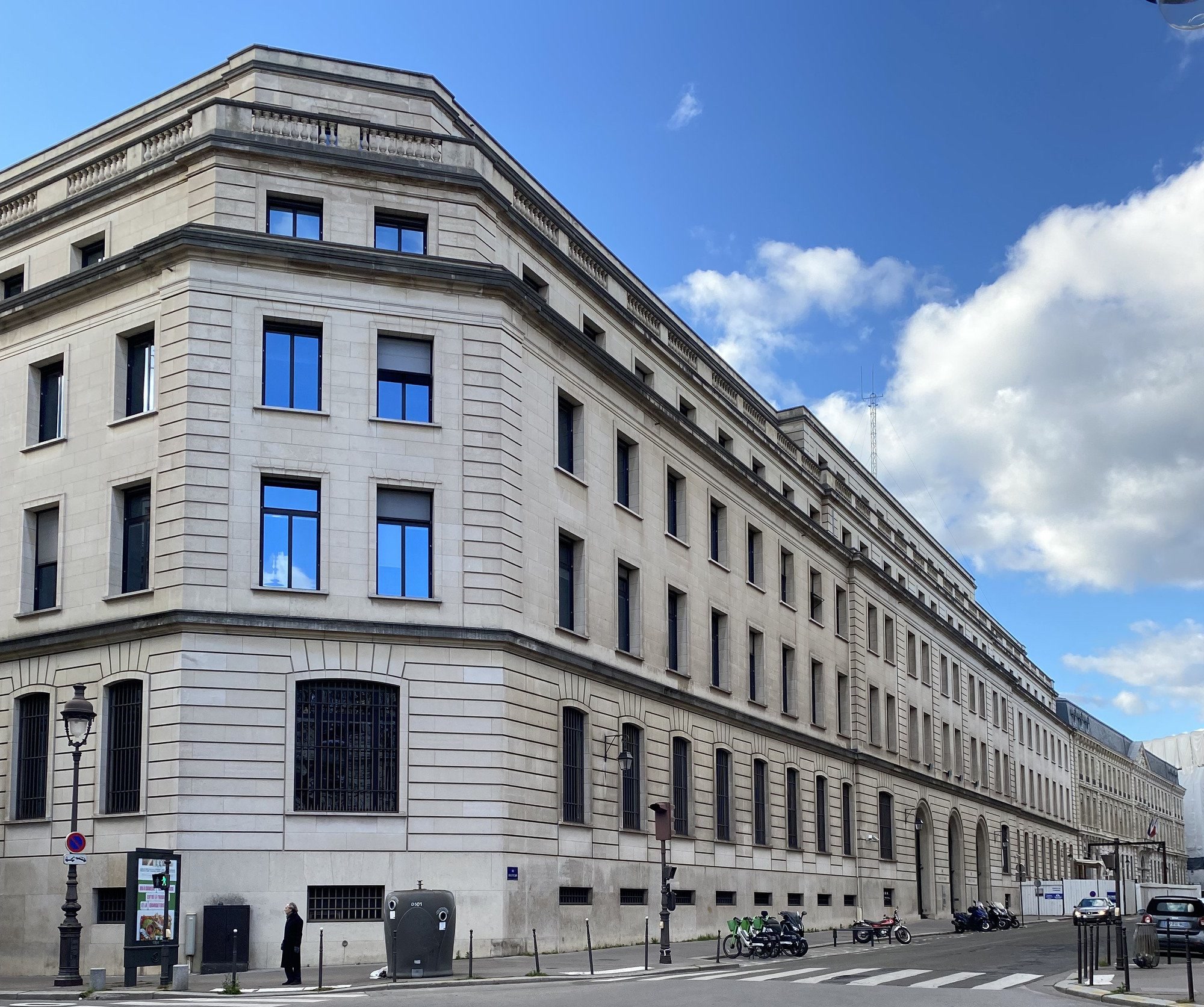 The Banque de France on rue Croix-des-Petits-Champs, a pale stone facade with columns and the bank's name across the frieze.