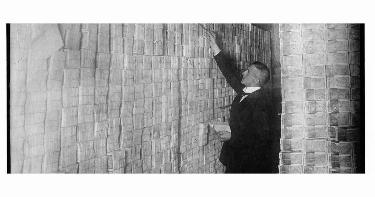 German children playing with worthless banknotes during the 1923 hyperinflation.